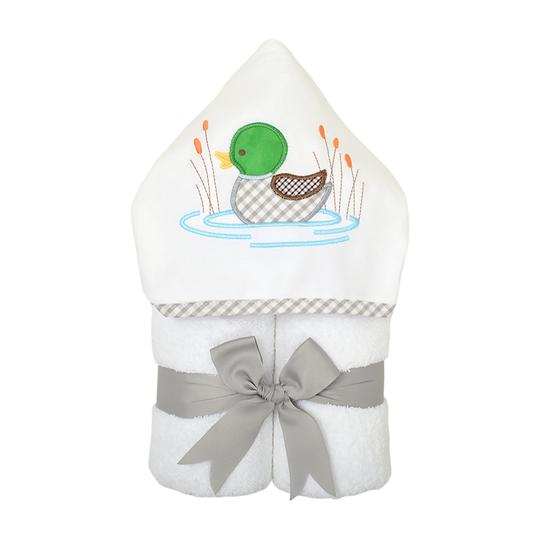 A rolled hooded towel from 3 Marthas featuring an adorable duck design, named 'Everykid Hooded Towel Mallard', beautifully tied with a grey ribbon, perfect for kids' bath time or beach outings.